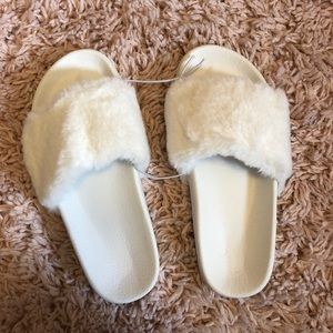 White fuzzy slip on